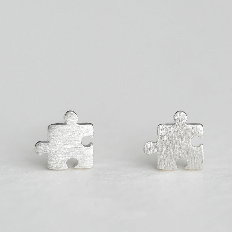 .925 Sterling Puzzle Piece Stud Earrings