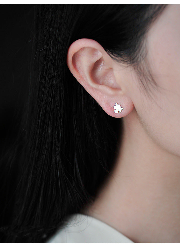 .925 Sterling Puzzle Piece Stud Earrings