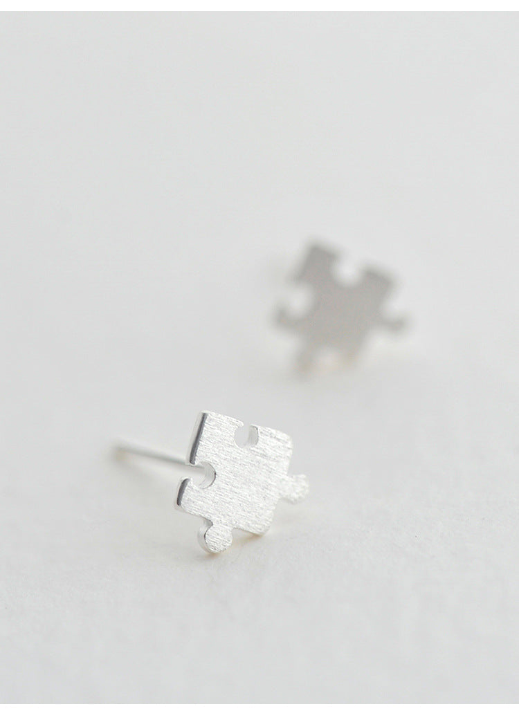 .925 Sterling Puzzle Piece Stud Earrings
