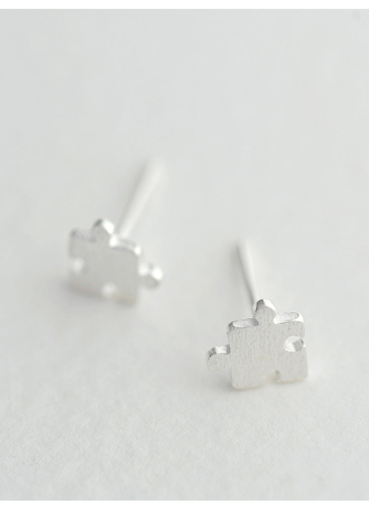 .925 Sterling Puzzle Piece Stud Earrings