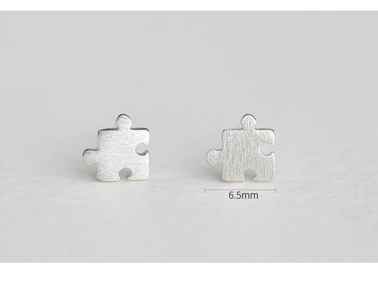 .925 Sterling Puzzle Piece Stud Earrings
