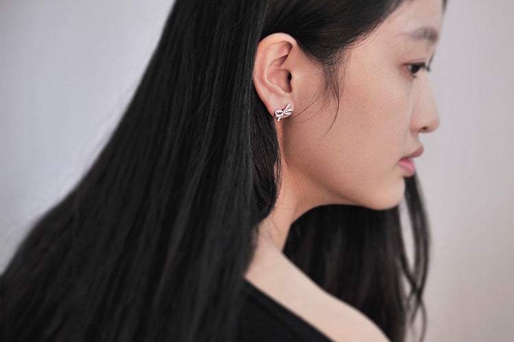 .925 Sterling Pave Bow Stud Earrings
