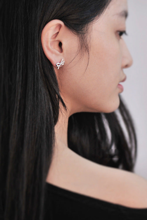.925 Sterling Pave Bow Stud Earrings