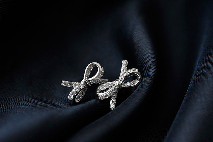 .925 Sterling Pave Bow Stud Earrings