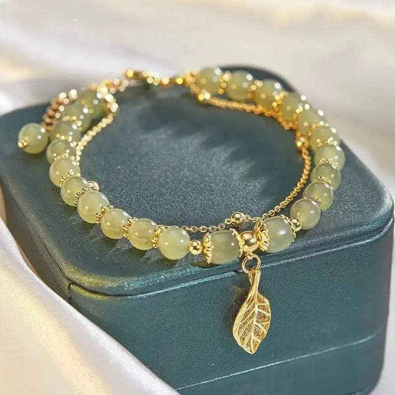 Jade Round Bead Bracelet with Gold Chain and Leaf Accent