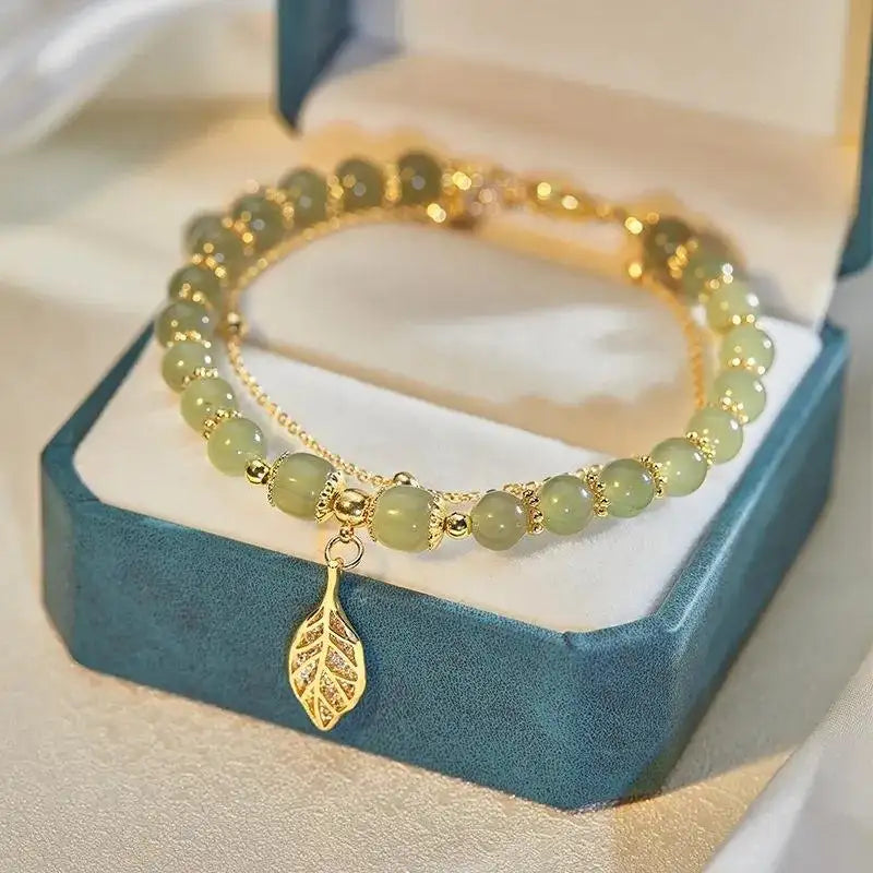 Jade Round Bead Bracelet with Gold Chain and Leaf Accent