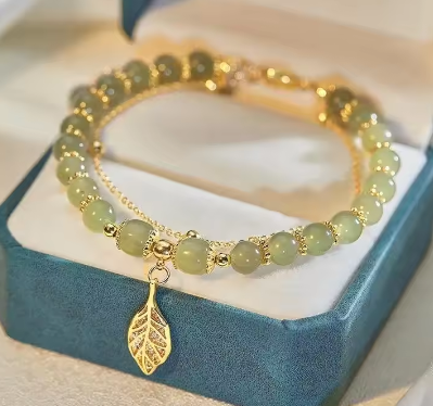 Jade Round Bead Bracelet with Gold Chain and Leaf Accent