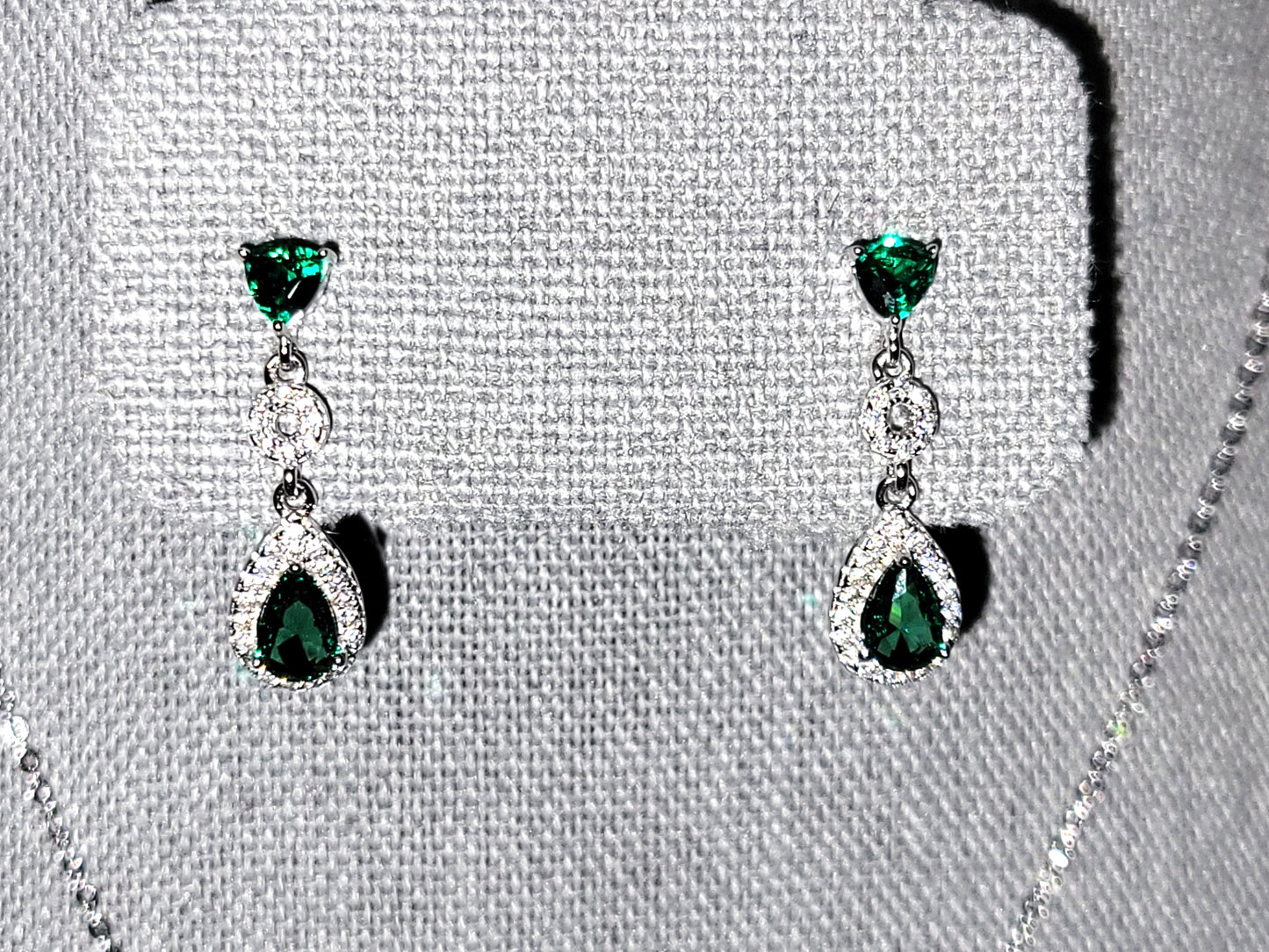 Aurora: Rhodium-plated .925 Sterling lab-created Emerald Teardrop and Diamond Earrings