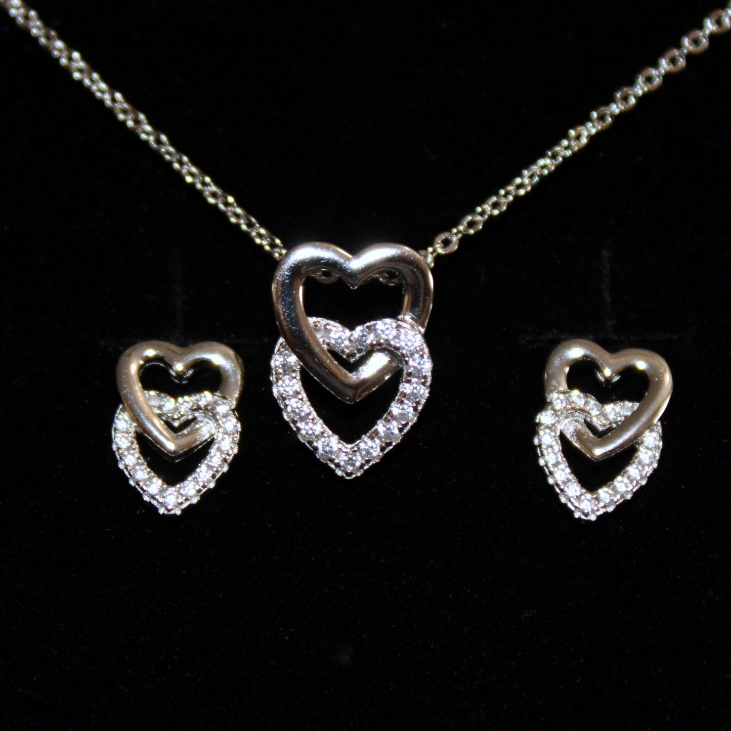 Miranda:  Rhodium-plated .925 Sterling lab-created Pave Diamond Double Heart Earrings