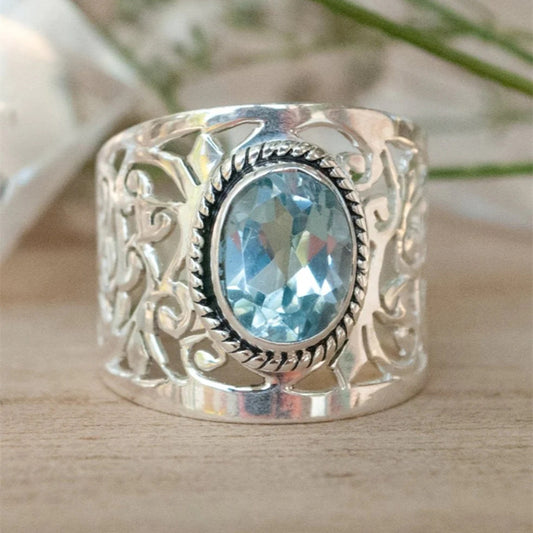 Silver Plated Band Ring with Oval Blue Topaz Cubic Zirconia
