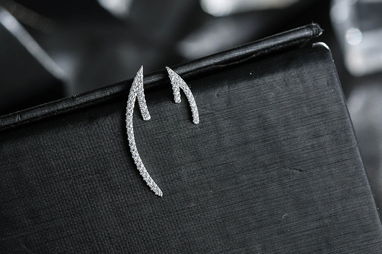 .925 Sterling Asymmetrical Arrow Earrings with CZ pave accents