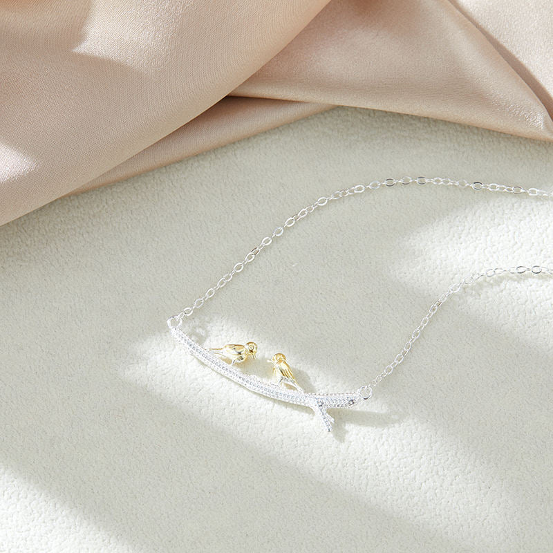 .925 Sterling Silver Twin Gold-plated Birds on Branch Necklace